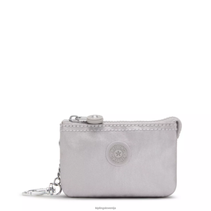 Kipling V4X2B609 gladka srebrna kovina creativity mini torbica kovinski obesek za ključe ženske obeski za ključe